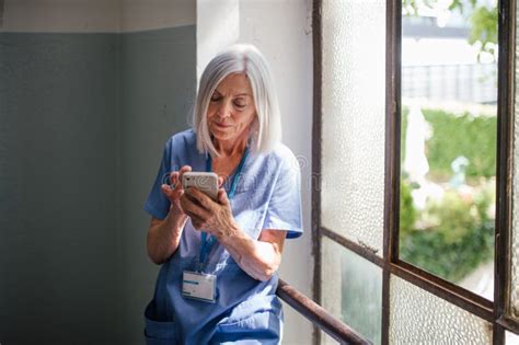 A picture of an old nurse working.