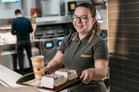 A picture of people working at McDonald's.