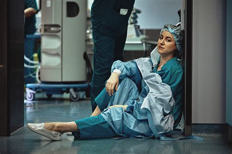 A picture of an exhausted nurse.