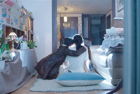A picture of women in their apartment.
